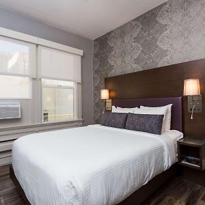 Kamer met een Queen Size Bed
